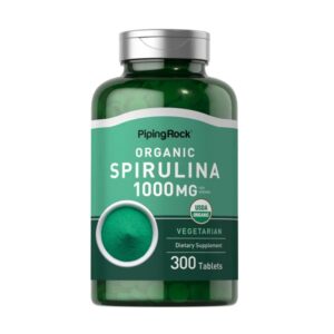 Flacone verde di integratore Spirulina biologica Piping Rock da 1000 mg per dose, con 300 compresse vegetariane e certificazione USDA Organic.