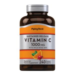 Flacone marrone di integratore Vitamina C 1000 mg Piping Rock a rilascio prolungato con rosa canina, contenente 240 compresse rivestite.