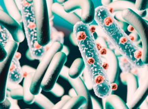 Rappresentazione 3D di batteri e microrganismi intestinali, con forme cilindriche e dettagli microscopici su sfondo verde, concetto di microbiota e salute digestiva. Microbiota